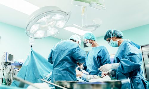 team of surgeons operating. Team of Surgeons Operating in the Hospital.