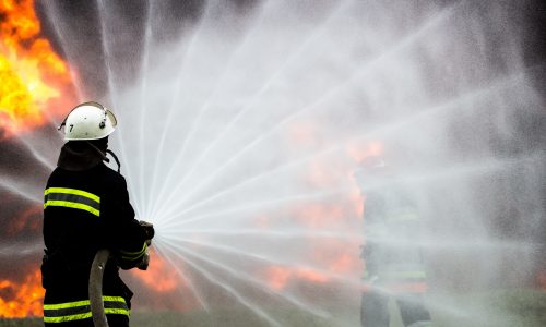 firefighters extinguish the fire during training